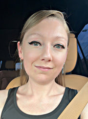 Model displaying Cubic Twist Earrings.